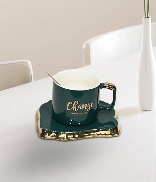 Tea Cup Saucer With Golden Spoon
